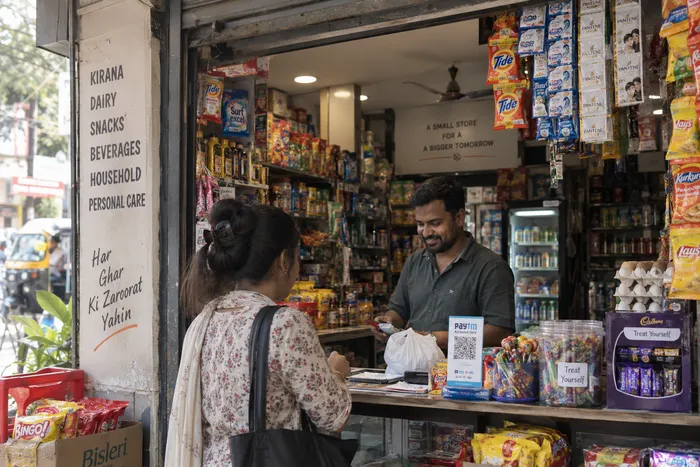 Kirana store owner using Store Mitr for daily billing and stock